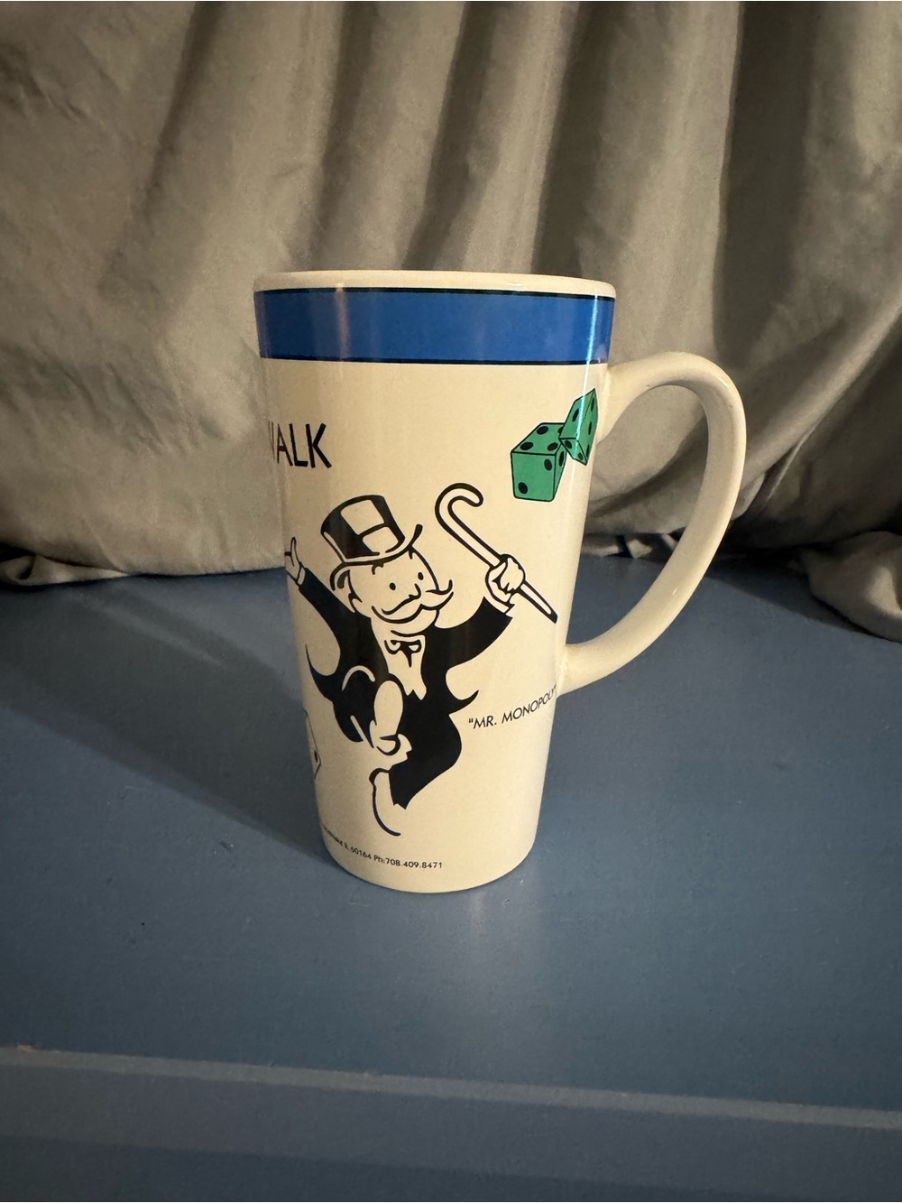 Hasbro White Ceramic Mr. Monopoly Tall Mug with Blue Rim and Green Dice
